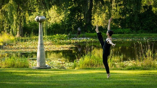 Woman dancing in art park