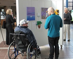 Visitors viewing Atrium Art