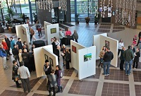 People viewing art in an atrium